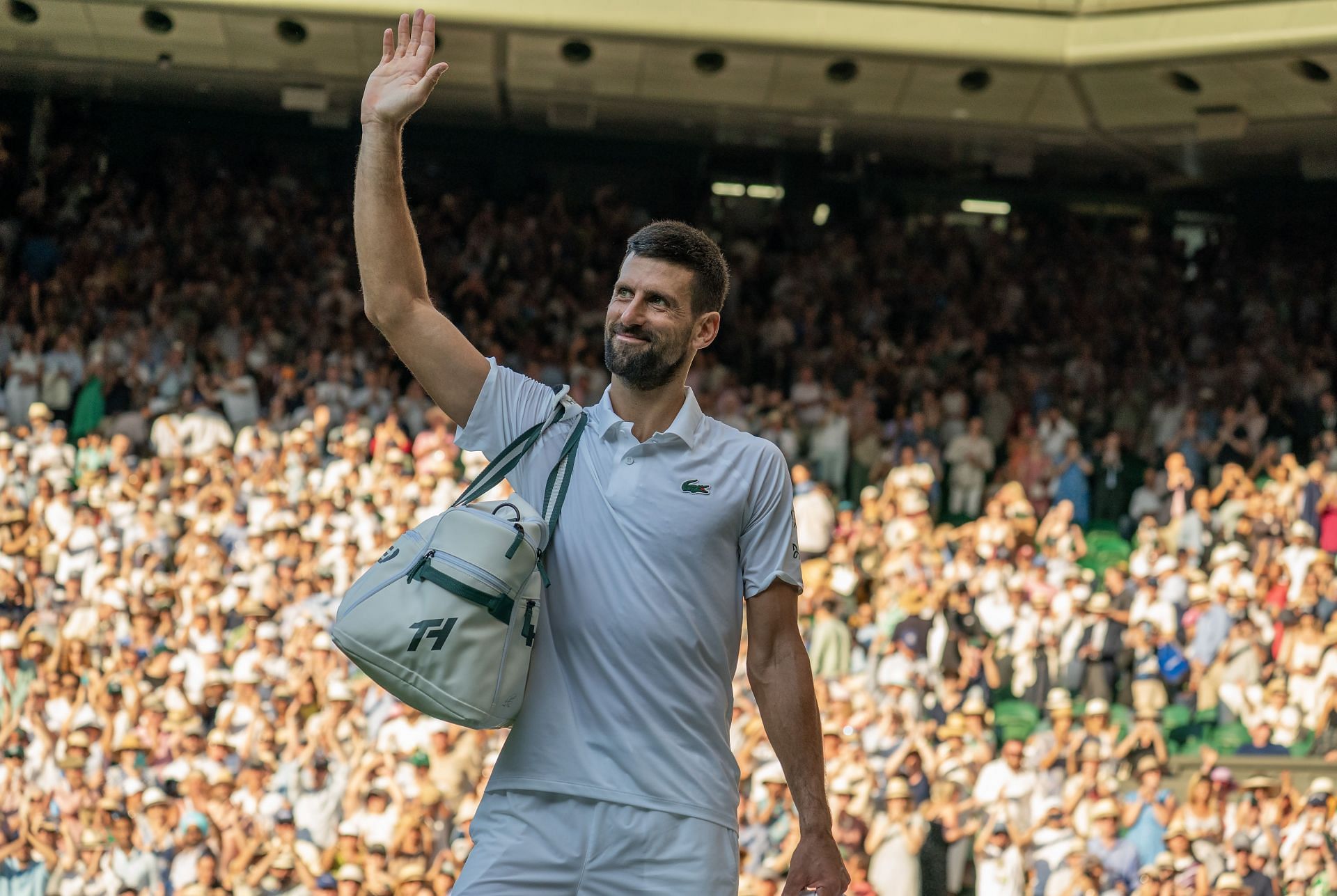 Novak Djokovic leaves Wimbledon's Centre Court after suffering a straight-set defeat at Jannik Sinner's hands (Source: Getty)
